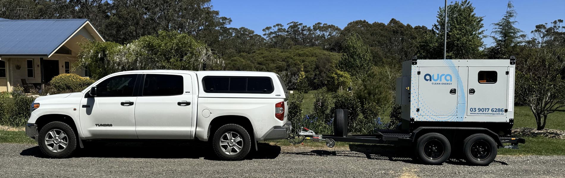 Trailer-mounted HESS30 towed by a ute from Aura Clean Energy